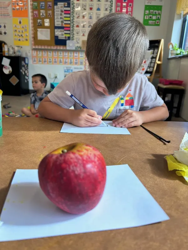 Preschool student at work
